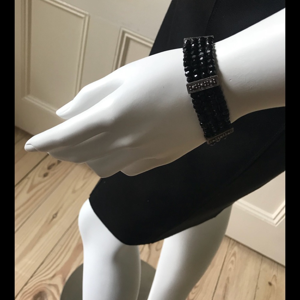 Four strand onyx or spinel  bead bracelet w/ silver stations